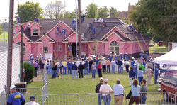 Workers help the new home of Steven and Shawna Farina of St. Meinrad begin to take shape. Volunteers turned out in large numbers to assist with the &ldquo;Extreme Makeover: Home Edition&rdquo; project.