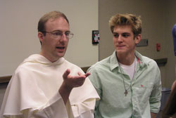Dominican Brother Patrick Tobin talks with Indiana University student Greg Jansen, part of the Dominicans&rsquo; efforts to share the faith on college campuses.