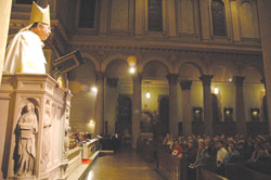 Archbishop Daniel M. Buechlein preaches during a Nov. 29 Mass at St. Joan of Arc Church in the Indianapolis North Deanery. The Mass was the first of a series of 11 deanery Masses to celebrate the canonization of St. Theodora Gu&eacute;rin.