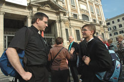 Father Thomas Schliessmann, left, pastor of St. Rose of Lima Parish in Franklin and Holy Trinity Parish in Edinburgh, chats on Oct. 14 with seminarian Sean Danda on the steps of St. Mary Major Basilica in Rome during the archdiocesan pilgrimage to Italy for the canonization of St. Theodora Gu&eacute;rin.