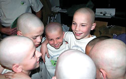 After Joey Chamness, right, was diagnosed with cancer, his twin brother, Robbie, and other friends from St. Thomas Aquinas School shaved their heads for the St. Baldrick&rsquo;s Foundation. (Submitted photo) 