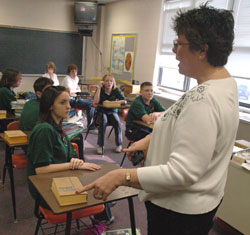 Paula Howard, Our Lady of the Greenwood middle school religion teacher, discusses &ldquo;The Lost Tomb of Jesus&rdquo; documentary with eighth-grade students on March 14.