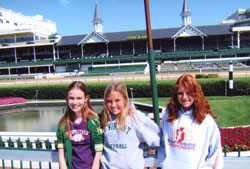 Jack and Marie Fink&rsquo;s granddaughters, Claire Meyerhoff of St. Louis, from left, and Hannah and Hilary Fink of Fort Wayne, Ind., tour Churchill Downs in Louisville, Ky., and the Kentucky Derby Museum there on a quiet day at the world-famous racetrack. (Photo by Marie Fink) 