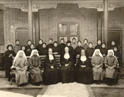 In this undated photo, seated in the middle of the front row, are three members of the Sisters of Providence of Saint Mary-of-the-Woods, who were among the order&rsquo;s first missionaries to China in 1920: from left, Sister Marie Patricia Shortall, Sister Marie Gratia Luking and Sister Mary Margaretta Grussinger. Surrounding them are the earliest postulants and novices of the Sister-Catechists of Providence, a religious order of Chinese women founded by the Sisters of Providence. (Submitted photo) 