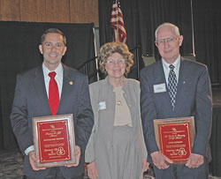 Right to Life of Indianapolis president Joan Byrum congratulates State Sen. Jeff Drozda of Westfield, Ind., left, and St. Luke parishioner John Hanagan of Indianapolis for their distinguished service to the cause of life during the organization&rsquo;s 25th&nbsp;annual &ldquo;Celebrate Life&rdquo; dinner on Sept.&nbsp;23 at the Indiana Convention Center in Indianapolis.
