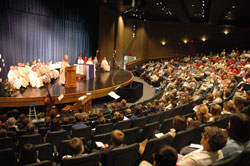 Archbishop Daniel M. Buechlein delivers his homily during an Oct. 3 Mass in honor of St. Theodora Gu&eacute;rin at Our Lady of Providence Jr./Sr. High School in Clarksville in the New Albany Deanery. Students from all the Catholic schools in the deanery were present for the Mass that concluded a yearlong series of liturgies in honor of Indiana&rsquo;s first saint that were celebrated in each of the archdiocese&rsquo;s 11 deaneries. (Photo by Sean Gallagher) 