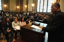 Deacon candidate Emilio Ferrer-Soto, who works for the Social Security Administration, gives a presentation about Social Security to a group of people who will soon become U.S. citizens during a naturalization ceremony held on Dec. 6 at the U.S. Federal Courthouse in Indianapolis. Ferrer-Soto has found opportunities in his work to direct Hispanic Catholics in the Indianapolis area to St. Patrick Parish&mdash;where he is a member&mdash;and the services it can offer them. (Photo by Sean Gallagher) 