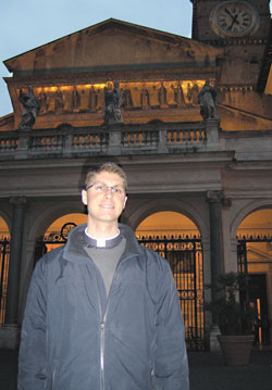 Seminarian Sean Danda stands in front of the Basilica of Santa Maria in Trastevere in Rome on Feb.&nbsp;21. The basilica is one of the station churches in Rome assigned to each day of Lent. Seminarians from the Pontifical North American College and other English-speakers in Rome celebrate Mass early each morning of Lent at the churches. (Submitted photo) 