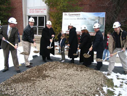 Participating in the Feb. 24 groundbreaking ceremony at St. Lawrence Parish in Indianapolis are, from left, Bob Schultz, chair of the parish&rsquo;s Legacy for Our Mission: For Our Children and the Future campaign; Greg Stephens, chair of the parish building committee; Father John Beitans, pastor; Emily Barnes, youth representative from St. Lawrence School; Betty Popp, principal of St. Lawrence School; Lisa Winbusch-Roach, chair of the St. Lawrence Pastoral Council; Michael Egan, chief architect from Entheos Architects; and Tim Berry of Meyer-Najem Construction. (Submitted photo) 