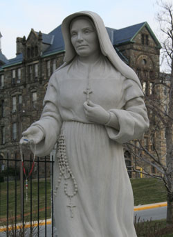 A marble statue of St. Theodora Gu&eacute;rin, the foundress of the Sisters of Providence of Saint Mary-of-the-Woods, stands outside of the Basilica of the National Shrine of the Immaculate Conception in Washington. The statue was sculpted by Teresa Clark of Terre Haute and carved by Nicholas Fairplay of Oberlin, Ohio. The statue will be dedicated on May 10. (Photo by Melissa Scarlett)