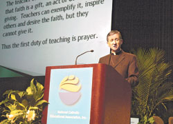 Bishop Blase J. Cupich of Rapid City, S.D., gives a keynote address on March 26 at the 2008 National Catholic Educational Association&rsquo;s annual convention in Indianapolis. Bishop Cupich spoke to approximately 1,000 convention participants about ways to address a decreasing participation in the life of the Church by many youths and young adults in a presentation titled &ldquo;Taking Proven Pathways to Face New Challenges.&rdquo; (Photo by Sean Gallagher) 