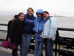 Marian College students Carrie&nbsp;Shelhart, from left, Staci&nbsp;Striegel, Sarah McEwan and Katie Louden spent four days in New York in March to participate in a United Nations study session called &ldquo;Women as Peacemakers.&rdquo; The Statue of Liberty can be seen in the background. (Submitted photo) 