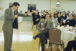 Dr. Ray Guarendi uses humor to deliver parenting advice during a &shy;presentation at the fourth&nbsp;annual Catholic Radio Indy dinner on March&nbsp;27 at the Riverwalk Banquet Center in Indianapolis. Guarendi is the co-host of the nationally syndicated show &ldquo;The Doctor Is In&rdquo; broadcast on Catholic radio stations from coast to coast and from 1 p.m. to 2 p.m. on Tuesday, Wednesday and Thursday on Catholic Radio Indy 89.1 FM. (Photo by Sean Gallagher) 