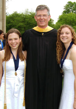 After they delivered their commencement speech together in May at Cathedral High School in Indianapolis, Elizabeth Flood, left, and Tori Schopper posed for a photo with Cathedral principal David&nbsp;Worland. (Submitted photo) 