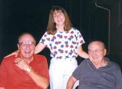 Father J. Joseph McNally, left, and the late Father John Sciarra, the founding pastor of St. Barnabas Parish, pose for a picture with parish secretary Theresa Warner of Indianapolis on July 4, 2000. The parish&rsquo;s Sciarra Center includes the gymnasium, the Atrium and McNally Hall, a large meeting and reception room. (Submitted photo) 