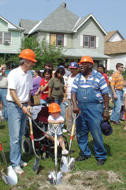 Lucious Newsom, right, and Anna Molloy break ground for Anna&rsquo;s House in 2005. The clinic was named in honor of Anna, who helped feed the poor from her wheelchair during her life. She died on July 31. (Submitted photo) 