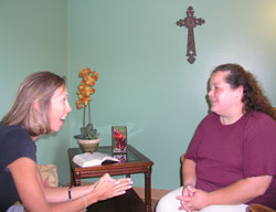 Cindy Workman, left, meets monthly with her spiritual director, Annie Endris. &ldquo;Spiritual direction helps me see God being active in my day,&rdquo; Workman says. &ldquo;Even when I&rsquo;m making macaroni and cheese or changing diapers, I see him as part of that.&rdquo; (Photo by John Shaughnessy) 