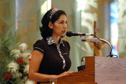 Veronica Arias, a member of St. Mary Parish in Indianapolis, serves as a lector during the Indianapolis East Deanery Mass honoring St. Theodora Gu&eacute;rin on May 23, 2006, at Holy Spirit Church in Indianapolis. (File photo by Mary Ann Wyand) 
