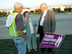 St. Luke the Evangelist parishioner John Hanagan of Indianapolis, left, talks with St. Bartholomew parishioner Eileen Hartman of Columbus, director of The Gabriel Project, a pro-life ministry for women experiencing crisis pregnancies, and Jim Sedlak, vice&nbsp;president of the American Life League and coordinator of STOPP, on Oct. 1, 2007, outside the Planned Parenthood abortion clinic (not pictured) at 8590 Georgetown Road in Indianapolis. (File photo by Mary Ann Wyand) 
