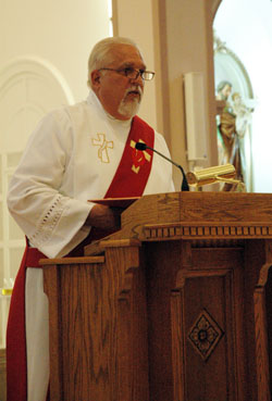 Deacon William Jones, who is a member of St. Bartholomew Parish in Columbus, preaches the homily during an archdiocesan Substance Addiction Ministry healing Mass on&nbsp;Sept. 14 at Holy Cross Church in Indianapolis. He shared his story of recovery from alcohol addiction, and quoted St.&nbsp;Augustine, who wrote that, &ldquo;Our pilgrimage on earth cannot be exempt from trial. &hellip; No one knows himself except through trial or receives a crown except after victory.&rdquo; (Photo by Mary Ann Wyand) 