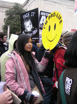 Jacinta Dela Cruz, a member of St. Patrick Parish in Terre&nbsp;Haute, shows her commitment to unborn children as&nbsp;she marches with archdiocesan pilgrims during the 2007&nbsp;March for Life in Washington, D.C. (Submitted photo) 