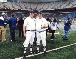 As members of the chain crew for the Indianapolis Colts, Ed Tinder, left, and Steve Taylor usually keep a calm and impartial approach at home games. But their joy for the Colts showed in this photo that was taken at the RCA&nbsp;Dome in Indianapolis after the Colts defeated the New England Patriots in the American Football Conference championship game in January of 2007. (Submitted photo) 