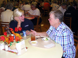 Oldenburg Academy of the Immaculate Conception senior Julie Martin of Aurora, left, listens to Franciscan Sister Ruthann Boyle. They have gotten to know each other over the past four years through the academy&rsquo;s Adopt-a-Sis program. (Submitted photo) 