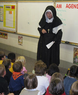 Madonna Paskash used an $8,000 Teacher Creativity Fellowship to study the life of St. Theodora Gu&eacute;rin so she could play the role for students at St. Charles Borromeo School in Bloomington, where she teaches third-grade students. (Submitted photo) 