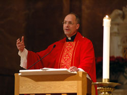 Father Jim Heyd, who serves as Cardinal Francis George&rsquo;s liaison for pro-life ministries in the Archdiocese of Chicago, preaches the homily during a Jan. 20 Mass at SS. Peter and Paul Cathedral in Indianapolis before he joined archdiocesan priests, high school students and chaperones on the pro-life pilgrimage to the 36th annual March for Life from Jan. 20-23 in Washington, D.C. (Photo by Mary Ann Wyand) 