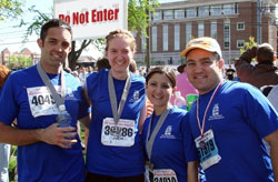Roger Neal, left, Julie Johnstone, Gabrielle Campo and Anthony Campo, all members of last year&rsquo;s Run for Vocations Team, pose together after completing the 2008 One America 500 Festival Mini-Marathon in Indianapolis. (Submitted photo) 