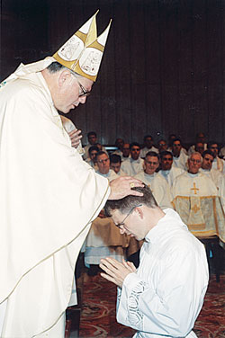 Archbishop Timothy M. Dolan of Milwaukee ordains then-seminarian Jonathan Meyer as a transitional deacon on Oct.&nbsp;9, 2002, at St. Peter&rsquo;s Basilica in Rome. Archbishop Dolan had been the rector of the Pontifical North&nbsp;American College in Rome during the first two years of now-Father Meyer&rsquo;s priestly formation there. On Feb. 23, Pope Benedict XVI appointed Archbishop Dolan to lead the Archdiocese of New York. (Submitted photo) 