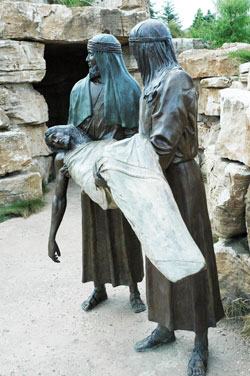 This bronze tableau depicts Christ&rsquo;s body being carried to an empty tomb by Joseph of Arimathea and Nicodemus in one of the dramatic Stations of the Cross at the &ldquo;Shrine of Christ&rsquo;s Passion&rdquo; in St.&nbsp;John, Ind. (Photo by Mary Ann Wyand)