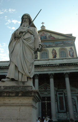 A statue of St. Paul stands outside the Basilica of St.&nbsp;Paul Outside-the-Walls in Rome, which is believed to have been built over his burial place. Father Stephen Banet, pastor of St. Jude Parish in Indianapolis, will be following in the footsteps of St. Paul, including a trip to Rome, during an upcoming sabbatical funded by a grant from Lilly Endowment Inc. (File photo by Sean Gallagher)