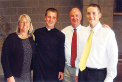 Danny Shine, a graduate of Bishop Chatard High School in Indianapolis stands with his mother, Kate, father, Kevin, and younger brother, Will. Danny is attending Mount St. Mary&rsquo;s Seminary in Maryland this fall. (Submitted photo)