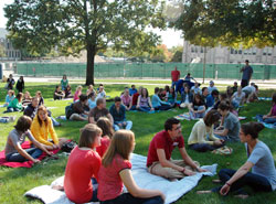 College students sit outside Butler University in Indianapolis to attend &ldquo;Mass on the Grass.&rdquo; Catholics at Butler Univeristy have no building to call their own, but Mass is offered most Sundays at 1:30 p.m. at the Johnson Room in Robertson Hall. (Submitted photo)