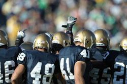 Members of the University of Notre Dame football team&rsquo;s special teams unit huddle during a home game on&nbsp;Oct. 4, 2008. (Photo courtesy of Notre Dame sports information department)