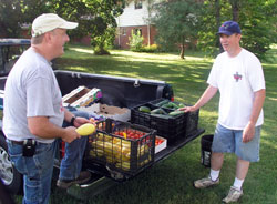 Tim Jerger, left, and John Naddy lead a parish garden at St.&nbsp;Matthew the Apostle Parish in Indianapolis, which supplies food for the poor and the hungry. (Photo by John Shaughnessy)