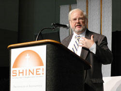 John Carr, executive director of justice, peace and human development for the U.S. Conference of Catholic Bishops addresses participants at the &ldquo;Spreading Hope in Neighborhoods Everywhere&rdquo; conference on Oct. 1 in Indianapolis. He challenged archdiocesan Catholics to embrace the social ministry and mission of the Church. (Photo by Mary Ann Wyand)