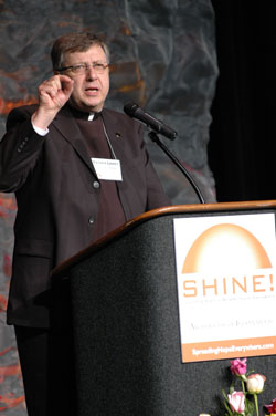 Father Larry Snyder, president of Catholic Charities USA, delivers his keynote address at the &ldquo;Spreading Hope in Neighborhoods Everywhere&rdquo; conference on Oct. 1 in Indianapolis. (Photo by Mary Ann Wyand)