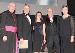 Msgr. Joseph F. Schaedel, left, vicar general; Daniel Elsener, president of Marian University in Indianapolis; Kali Genos, a Marian student; Jerry Semler; and Karen Ristau, president of the National Catholic Educational Association (NCEA), pose on Oct. 4 in Washington after a ceremony during which Semler received a St. Elizabeth Ann Seton Award, the NCEA&rsquo;s highest honor. (Submitted photo) 