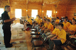 Then-Father Paul Etienne, vice rector of Bishop Simon Bruté College Seminary in Indianapolis, gives a presentation on the virtue of charity to a group of high school campers during Bishop Bruté Days, a vocations camp sponsored by the seminary held at the Future Farmers of America Center in Johnson County on June 12, 2008. (File photo by Sean Gallagher)