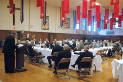 Archbishop Daniel M. Buechlein speaks to members of the board of directors of the Catholic Community Foundation and other guests at the foundation&rsquo;s annual meeting on Nov. 4 at the Archbishop O&rsquo;Meara Catholic Center in Indianapolis. (Photo by Sean Gallagher)