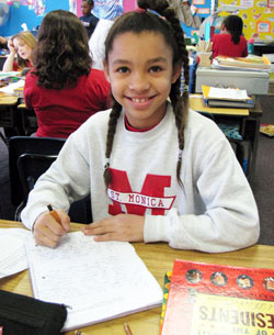 In her religion class at St. Monica School in Indianapolis, third-grade student Taylor&nbsp;Wentland wrote that Jesus is happy when we use our talents, take care of nature and love one&nbsp;another. (Submitted photo)