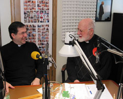 Father Frank Pavone, left, the founder and national director of Priests for Life, based in Staten Island, N.Y., and pastoral director of the Rachel&rsquo;s Vineyard post-abortion reconciliation ministries, talks with Msgr. Lawrence Moran, a retired diocesan priest, during a pro-life radio program on WHOJ, an Eternal Word Television Network station in Terre Haute, in late January. (Submitted photo)