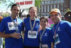 Roger Neal, left, Julie Johnstone, Gabrielle Campo and Anthony Campo, members of the 2008 &ldquo;Race for Vocations&rdquo; team, pose for a photo after completing the One America 500 Festival Mini-Marathon in Indianapolis. (Submitted photo)