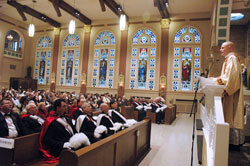 Father John Hollowell reflects on joy during his first year as a priest during the close of a 40 Hours devotion on March 10 at Our Lady of the Most Holy Rosary Church in Indianapolis. The reflection was part of Holy Rosary&rsquo;s 10th annual &ldquo;Spaghetti and Spirituality&rdquo; Lenten adult educational series. (Photo by Sean Gallagher)
