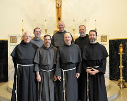 Members of the new definitory of the Conventual Franciscan Friars of the Province of Our Lady of Consolation include, front row, from left, Friars Camillus Gott, John Stowe, James Kent and Paul Clark, and, back row, Friars Mark Weaver, Wayne Hellmann and Martin Day. (Submitted photo)