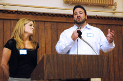 Indianapolis Colts center Jeff Saturday and his wife, Karen, of Carmel, Ind., praise the teenage peer mentors for the archdiocesan A Promise to Keep: God&rsquo;s Gift of Human Sexuality chastity program for their volunteer service as role models during an annual awards luncheon on April 15 at the Archbishop O&rsquo;Meara Catholic Center in Indianapolis. (Photo by Mary Ann Wyand)