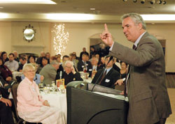 Marcus Grodi, the host of EWTN&rsquo;s &ldquo;The Journey Home&rdquo; and &ldquo;Deep in Scripture,&rdquo; speaks about how parents can keep their children Catholic during the sixth annual Catholic Radio Dinner, a fundraising dinner for WSPM, Catholic Radio Indy 89.1 FM. About 250 people attended the April 8 event. (Photo by Sean Gallagher)