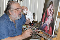 Cuban American artist Vincent Mendez Perez works on a painting of the Blessed Virgin Mary in his studio at his home in Miami. He will display his artwork at The Secret Ingredient stores in Indianapolis and Richmond, respectively, on July 15 and 16. Perez&rsquo;s oil paintings will be available for purchase at both locations. (Submitted photo)